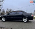 Чорний Міцубісі Lancer, об'ємом двигуна 1.6 л та пробігом 303 тис. км за 4350 $, фото 18 на Automoto.ua