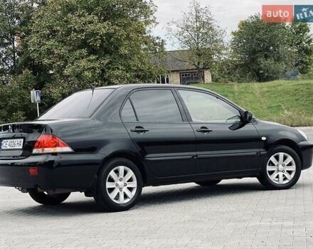 Чорний Міцубісі Lancer, об'ємом двигуна 1.6 л та пробігом 243 тис. км за 4950 $, фото 21 на Automoto.ua