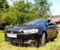 Черный Мицубиси Лансер, объемом двигателя 1.5 л и пробегом 240 тыс. км за 6900 $, фото 1 на Automoto.ua