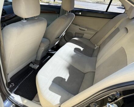 Чорний Міцубісі Lancer, об'ємом двигуна 1.5 л та пробігом 207 тис. км за 6400 $, фото 6 на Automoto.ua