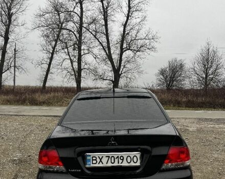 Черный Мицубиси Лансер, объемом двигателя 1.6 л и пробегом 272 тыс. км за 2800 $, фото 3 на Automoto.ua