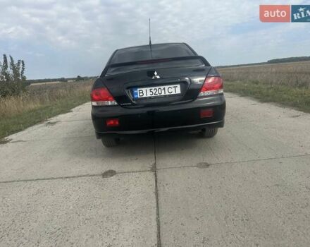 Чорний Міцубісі Lancer, об'ємом двигуна 1.6 л та пробігом 310 тис. км за 5100 $, фото 17 на Automoto.ua