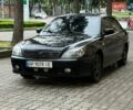 Черный Мицубиси Лансер, объемом двигателя 1.58 л и пробегом 170 тыс. км за 2950 $, фото 1 на Automoto.ua