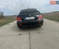 Чорний Міцубісі Lancer, об'ємом двигуна 1.6 л та пробігом 310 тис. км за 5100 $, фото 17 на Automoto.ua