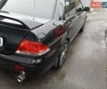 Черный Мицубиси Лансер, объемом двигателя 1.58 л и пробегом 180 тыс. км за 4500 $, фото 7 на Automoto.ua
