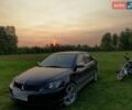 Чорний Міцубісі Lancer, об'ємом двигуна 2 л та пробігом 210 тис. км за 4200 $, фото 1 на Automoto.ua