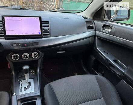 Чорний Міцубісі Lancer, об'ємом двигуна 2 л та пробігом 220 тис. км за 7700 $, фото 10 на Automoto.ua