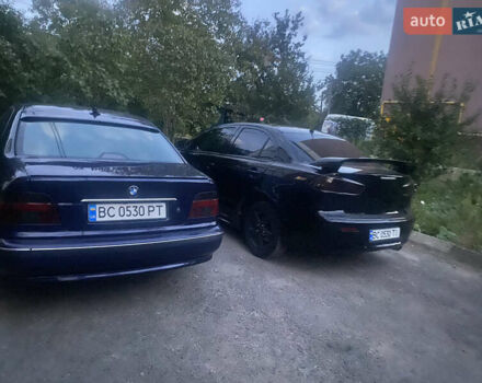 Черный Мицубиси Лансер, объемом двигателя 2 л и пробегом 333 тыс. км за 7300 $, фото 14 на Automoto.ua