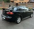 Чорний Міцубісі Lancer, об'ємом двигуна 2 л та пробігом 230 тис. км за 6800 $, фото 2 на Automoto.ua