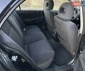 Черный Мицубиси Лансер, объемом двигателя 1.58 л и пробегом 139 тыс. км за 5200 $, фото 42 на Automoto.ua