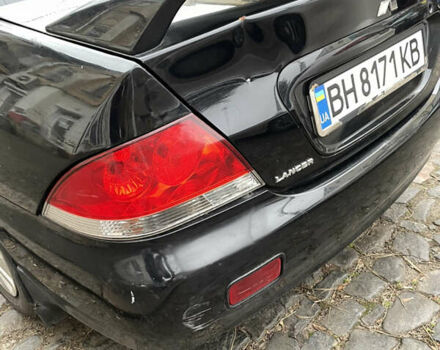 Чорний Міцубісі Lancer, об'ємом двигуна 1.6 л та пробігом 213 тис. км за 3000 $, фото 5 на Automoto.ua
