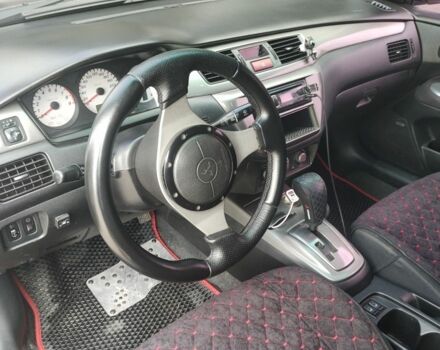 Міцубісі Lancer 2007 у Кам'янське (Дніпродзержинськ) на Automoto.ua Чорний Міцубісі Lancer, об'ємом двигуна 2 л та пробігом 268 тис. км за 5999 $, фото 6 на Automoto.ua