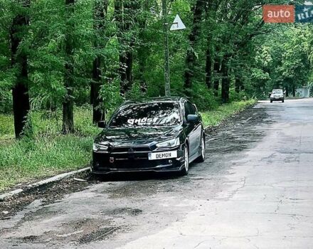 Чорний Міцубісі Lancer, об'ємом двигуна 2 л та пробігом 226 тис. км за 7200 $, фото 16 на Automoto.ua