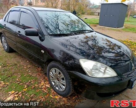 Чорний Міцубісі Lancer, об'ємом двигуна 1.6 л та пробігом 227 тис. км за 4100 $, фото 1 на Automoto.ua