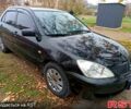 Чорний Міцубісі Lancer, об'ємом двигуна 1.6 л та пробігом 227 тис. км за 4100 $, фото 1 на Automoto.ua