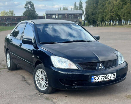 Мицубиси Лансер 2007 в Харькове на Automoto.ua Черный Мицубиси Лансер, объемом двигателя 1.58 л и пробегом 278 тыс. км за 3500 $, фото 1 на Automoto.ua