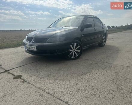 Чорний Міцубісі Lancer, об'ємом двигуна 1.6 л та пробігом 310 тис. км за 5100 $, фото 22 на Automoto.ua