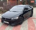 Черный Мицубиси Лансер, объемом двигателя 2 л и пробегом 217 тыс. км за 5500 $, фото 1 на Automoto.ua
