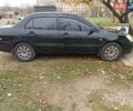 Чорний Міцубісі Lancer, об'ємом двигуна 1.58 л та пробігом 227 тис. км за 4100 $, фото 4 на Automoto.ua