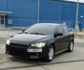 Черный Мицубиси Лансер, объемом двигателя 2 л и пробегом 240 тыс. км за 6800 $, фото 1 на Automoto.ua