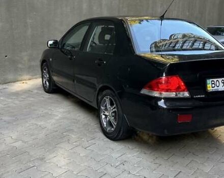 Чорний Міцубісі Lancer, об'ємом двигуна 1.58 л та пробігом 135 тис. км за 4100 $, фото 2 на Automoto.ua