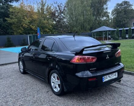Чорний Міцубісі Lancer, об'ємом двигуна 2 л та пробігом 300 тис. км за 6185 $, фото 2 на Automoto.ua