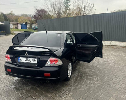Чорний Міцубісі Lancer, об'ємом двигуна 2 л та пробігом 210 тис. км за 5500 $, фото 15 на Automoto.ua