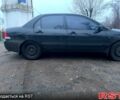 Черный Мицубиси Лансер, объемом двигателя 1.6 л и пробегом 201 тыс. км за 4000 $, фото 4 на Automoto.ua