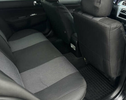 Черный Мицубиси Лансер, объемом двигателя 2 л и пробегом 260 тыс. км за 5300 $, фото 12 на Automoto.ua