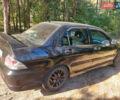 Чорний Міцубісі Lancer, об'ємом двигуна 2 л та пробігом 290 тис. км за 3300 $, фото 4 на Automoto.ua
