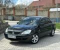 Чорний Міцубісі Lancer, об'ємом двигуна 1.6 л та пробігом 270 тис. км за 4499 $, фото 1 на Automoto.ua