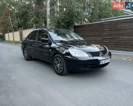Черный Мицубиси Лансер, объемом двигателя 1.58 л и пробегом 278 тыс. км за 4800 $, фото 1 на Automoto.ua