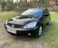 Чорний Міцубісі Lancer, об'ємом двигуна 1.6 л та пробігом 224 тис. км за 4950 $, фото 1 на Automoto.ua