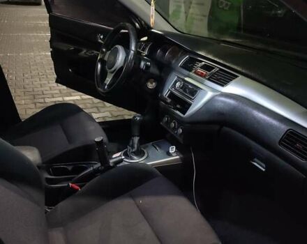 Чорний Міцубісі Lancer, об'ємом двигуна 2 л та пробігом 145 тис. км за 5000 $, фото 3 на Automoto.ua