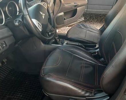 Міцубісі Lancer 2007 у Києві на Automoto.ua Чорний Міцубісі Lancer, об'ємом двигуна 2 л та пробігом 238 тис. км за 5350 $, фото 11 на Automoto.ua