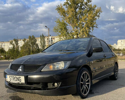 Чорний Міцубісі Lancer, об'ємом двигуна 2 л та пробігом 280 тис. км за 4600 $, фото 1 на Automoto.ua