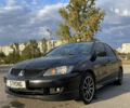 Чорний Міцубісі Lancer, об'ємом двигуна 2 л та пробігом 280 тис. км за 4600 $, фото 1 на Automoto.ua