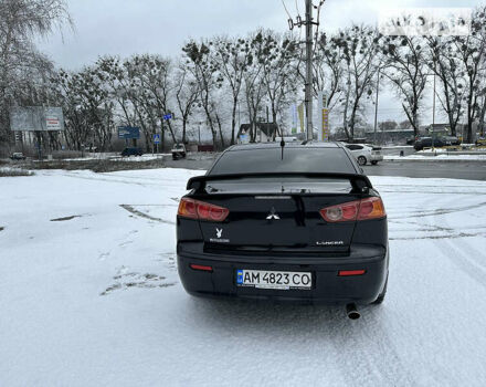 Чорний Міцубісі Lancer, об'ємом двигуна 2 л та пробігом 199 тис. км за 7000 $, фото 6 на Automoto.ua