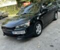 Чорний Міцубісі Lancer, об'ємом двигуна 2 л та пробігом 165 тис. км за 6496 $, фото 1 на Automoto.ua