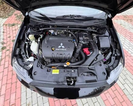 Черный Мицубиси Лансер, объемом двигателя 2 л и пробегом 217 тыс. км за 5500 $, фото 11 на Automoto.ua