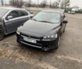 Черный Мицубиси Лансер, объемом двигателя 2 л и пробегом 247 тыс. км за 7900 $, фото 1 на Automoto.ua