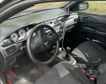 Черный Мицубиси Лансер, объемом двигателя 1.6 л и пробегом 244 тыс. км за 4500 $, фото 4 на Automoto.ua