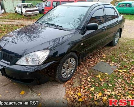 Чорний Міцубісі Lancer, об'ємом двигуна 1.6 л та пробігом 227 тис. км за 4100 $, фото 5 на Automoto.ua