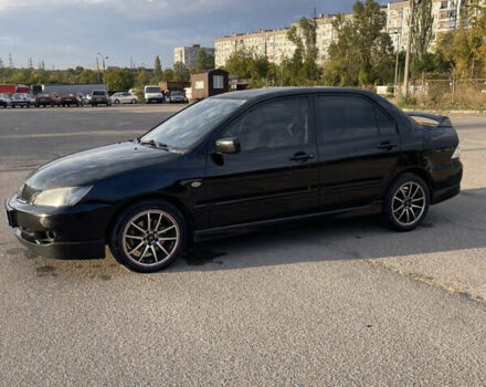 Чорний Міцубісі Lancer, об'ємом двигуна 2 л та пробігом 280 тис. км за 4600 $, фото 9 на Automoto.ua