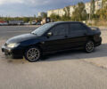 Чорний Міцубісі Lancer, об'ємом двигуна 2 л та пробігом 280 тис. км за 4600 $, фото 9 на Automoto.ua