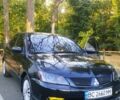 Чорний Міцубісі Lancer, об'ємом двигуна 1.6 л та пробігом 221 тис. км за 4600 $, фото 1 на Automoto.ua