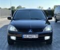 Чорний Міцубісі Lancer, об'ємом двигуна 1.6 л та пробігом 191 тис. км за 4899 $, фото 3 на Automoto.ua