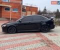 Черный Мицубиси Лансер, объемом двигателя 2 л и пробегом 217 тыс. км за 5500 $, фото 4 на Automoto.ua