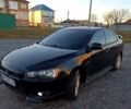 Чорний Міцубісі Lancer, об'ємом двигуна 2 л та пробігом 280 тис. км за 6900 $, фото 6 на Automoto.ua
