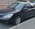Чорний Міцубісі Lancer, об'ємом двигуна 1.6 л та пробігом 265 тис. км за 4650 $, фото 1 на Automoto.ua